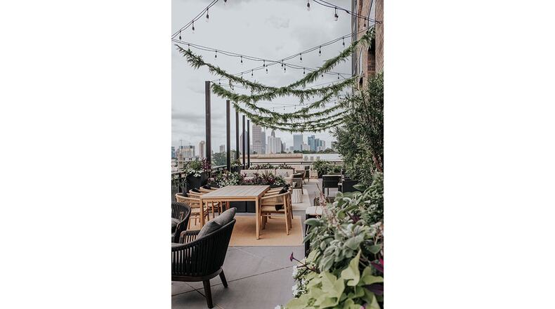 The terrace at Drawbar, the restaurant and lounge at the new Bellyard Hotel in West Midtown, offers a view of Midtown Atlanta.
Photo by Caleb Jones Photography