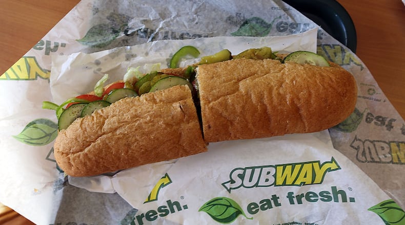 MIAMI, FL - OCTOBER 21: A Subway sandwich is seen in a restaurant as the company announced a settlement over a class-action lawsuit that alleged that Subway engaged in deceptive marketing for its 6-inch and 12-inch sandwiches and served customers less food than they were paying for on October 21, 2015 in Miami, Florida. While it denies the claims, Subway said that franchisees would be required to have a measurement tool in stores to make sure loaves are 12-inches. (Photo by Joe Raedle/Getty Images)