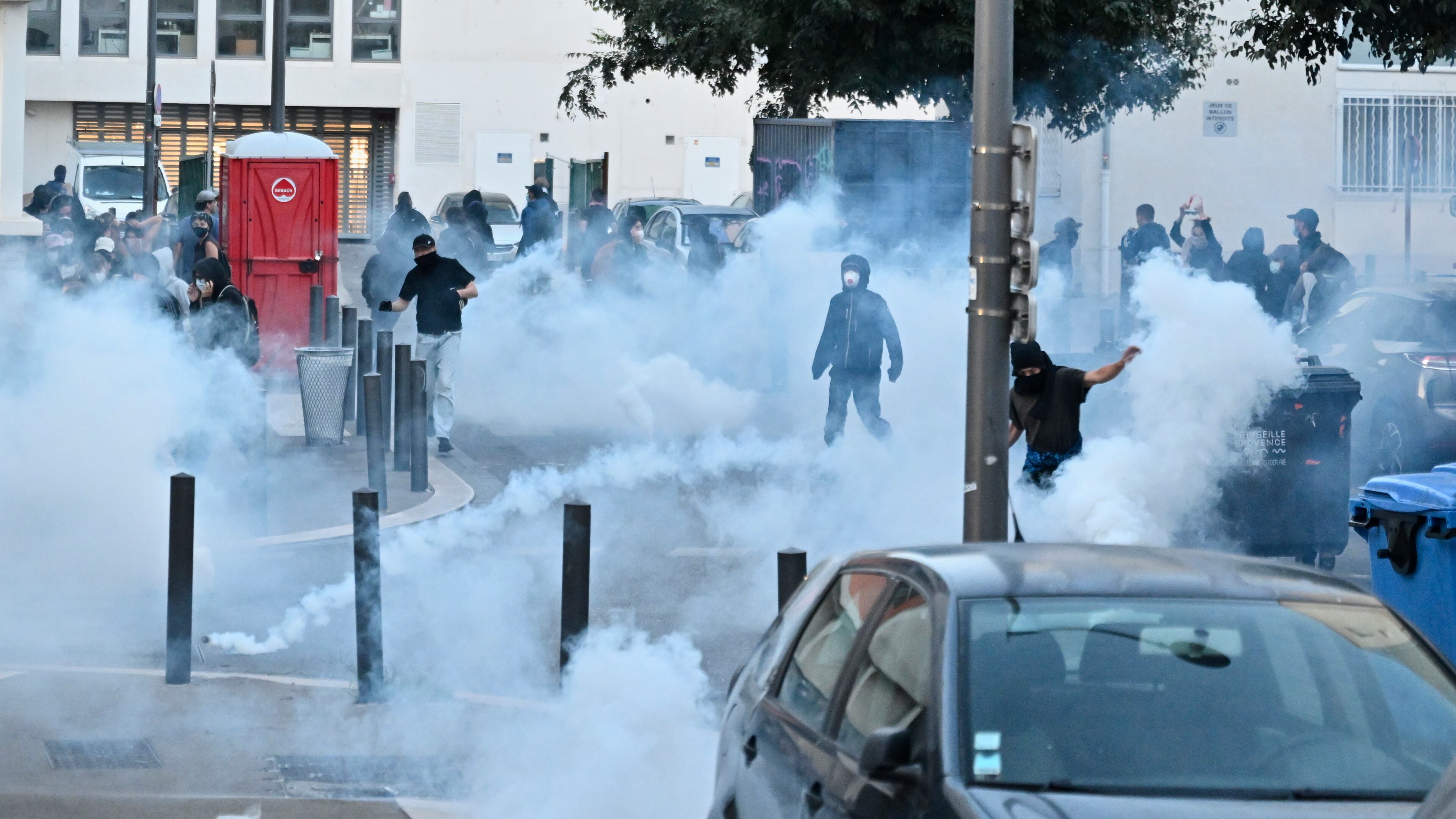 French police fire tear gas grenades to protesters during a gathering of the "Block Everything" movement in Marseille, south of France, Wednesday, Sept. 10, 2025. (AP Photo/Philippe Magoni)