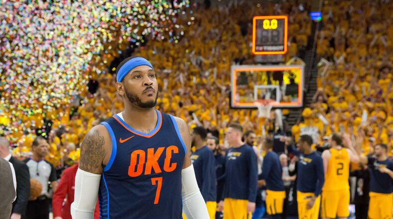Oklahoma City Thunder forward Carmelo Anthony (7) walks off the court after losing game six of the first round of the 2018 NBA Playoffs against against the Utah Jazz at Vivint Smart Home Arena.