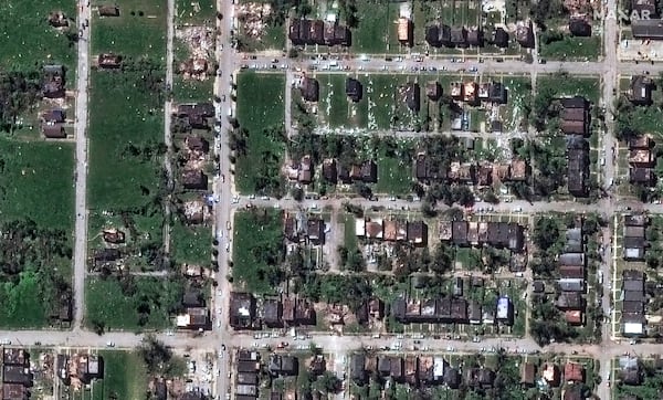 This satellite image provided by Maxar Technologies shows houses after they were damaged by a tornado near Ashland Avenue, Monday, May 18, 2025, in northwest St. Louis. (Maxar Technologies via AP)