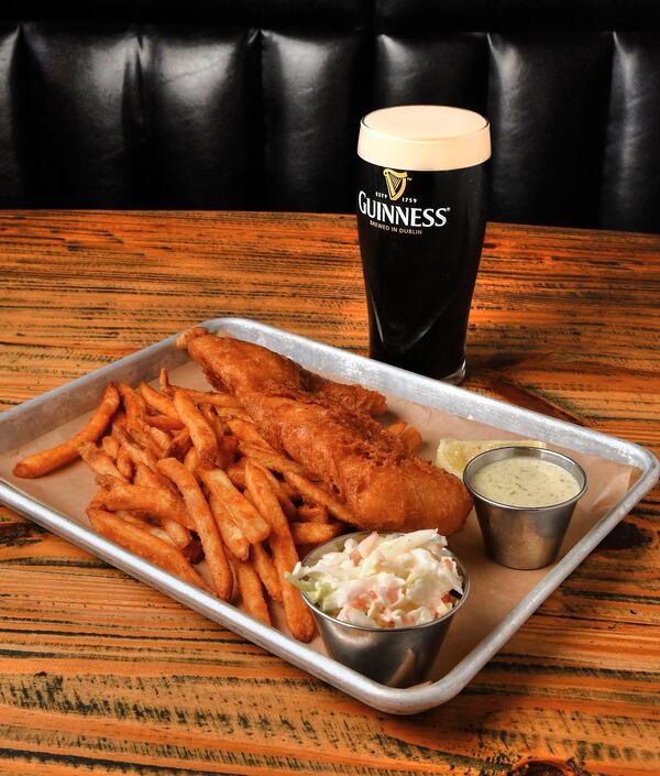Ale Battered Fried Fish, shown with a Guinness Stout, goes well with french fries and coleslaw. (Styling by Ian Macken / Chris Hunt for the AJC)