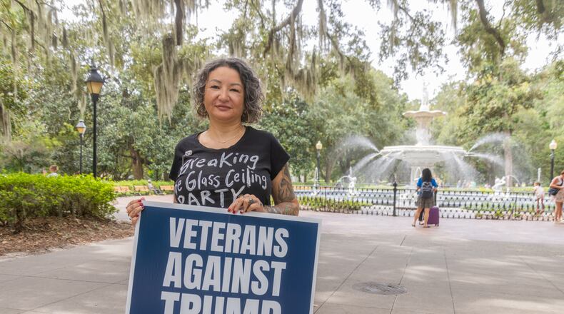Air Force vet Tabatha Strozier of Savannah said she had a hard time choosing which campaign sign to order for her yard. One option was “Veterans For Biden.” Another was “Veterans Against Trump.” Then President Joe Biden ended his campaign. “Now, with Kamala Harris as the nominee instead of Biden," she said, "I’m really glad I went anti-Trump.” (AJC Photo/Katelyn Myrick)