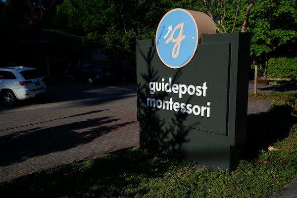 A sign for the Guidepost Montessori school is seen Friday, July 18, 2025, in Beaverton, Ore. (AP Photo/Jenny Kane)