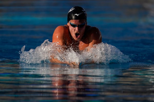 FILE - Grant House competes in the men's 200-meter IM final at the TYR Pro Swim Series swim meet on Saturday, June 4, 2022, in Mission Viejo, Calif. (AP Photo/Ashley Landis, File)