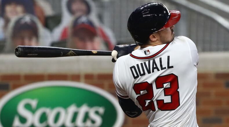 Braves outfielder Adam Duvall hits a grand slam, his third homer of the night, for a 29-9 lead over the Miami Marlins during the seventh inning Wednesday.