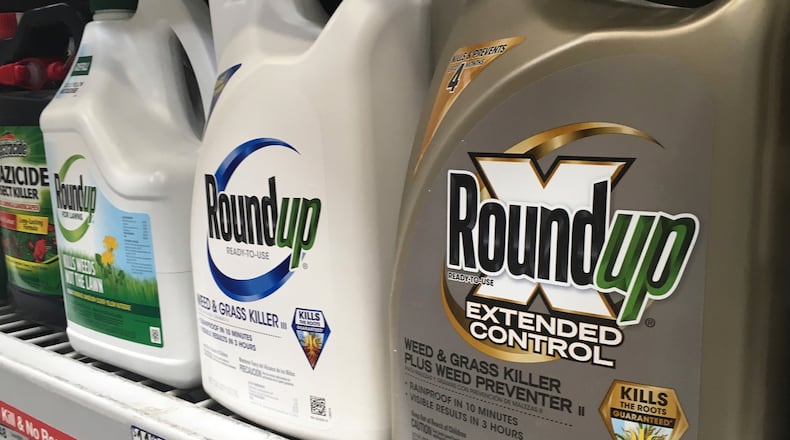 FILE - Containers of Roundup are displayed on a store shelf on Feb. 24, 2019, in San Francisco. (AP Photo/Haven Daley, File)