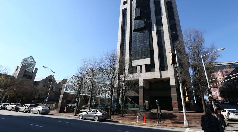 The Fulton County Government Center is where commissioners do the business of the county's 1 million residents. BOB ANDRES / BANDRES@AJC.COM