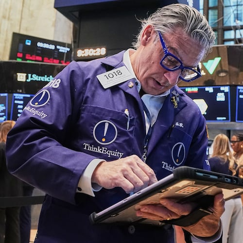 Trader John Romolo works on the floor of the New York Stock Exchange, Wednesday, June 3, 2026. (AP Photo/Richard Drew)