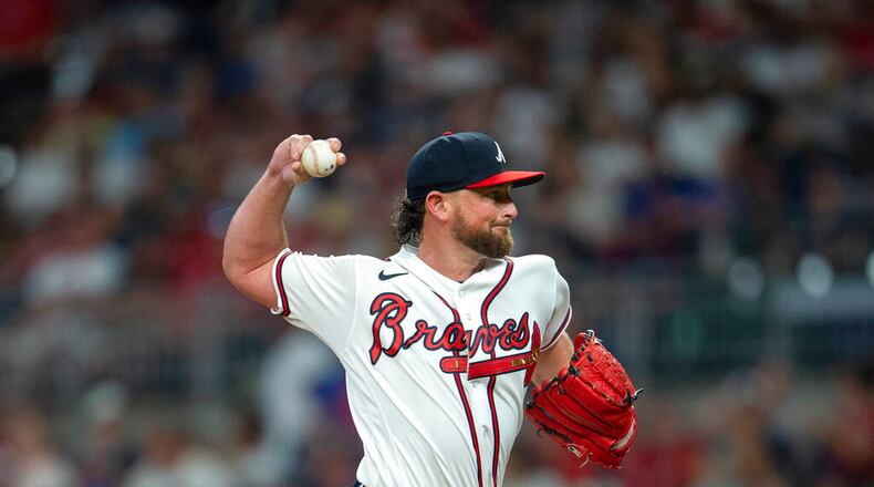 Atlanta Braves relief pitcher Kirby Yates throws in the seventh inning of a baseball game against the Houston Astros Saturday, Aug. 20, 2022, in Atlanta. (AP Photo/Hakim Wright Sr.)