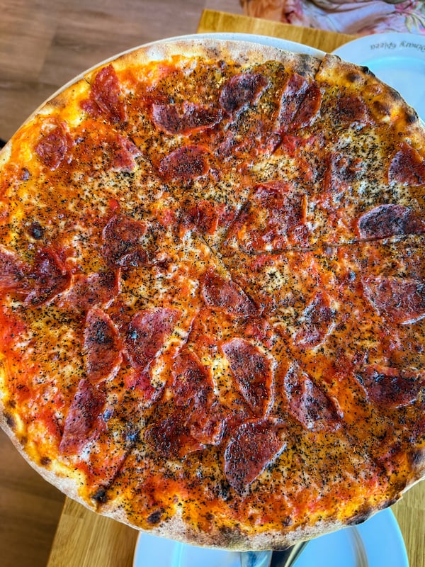 The Coffee Paolo at Mister O1 Extraordinary Pizza has an addictive flavor combination of gorgonzola cheese, honey, coffee and spicy salami. (Henri Hollis/AJC)