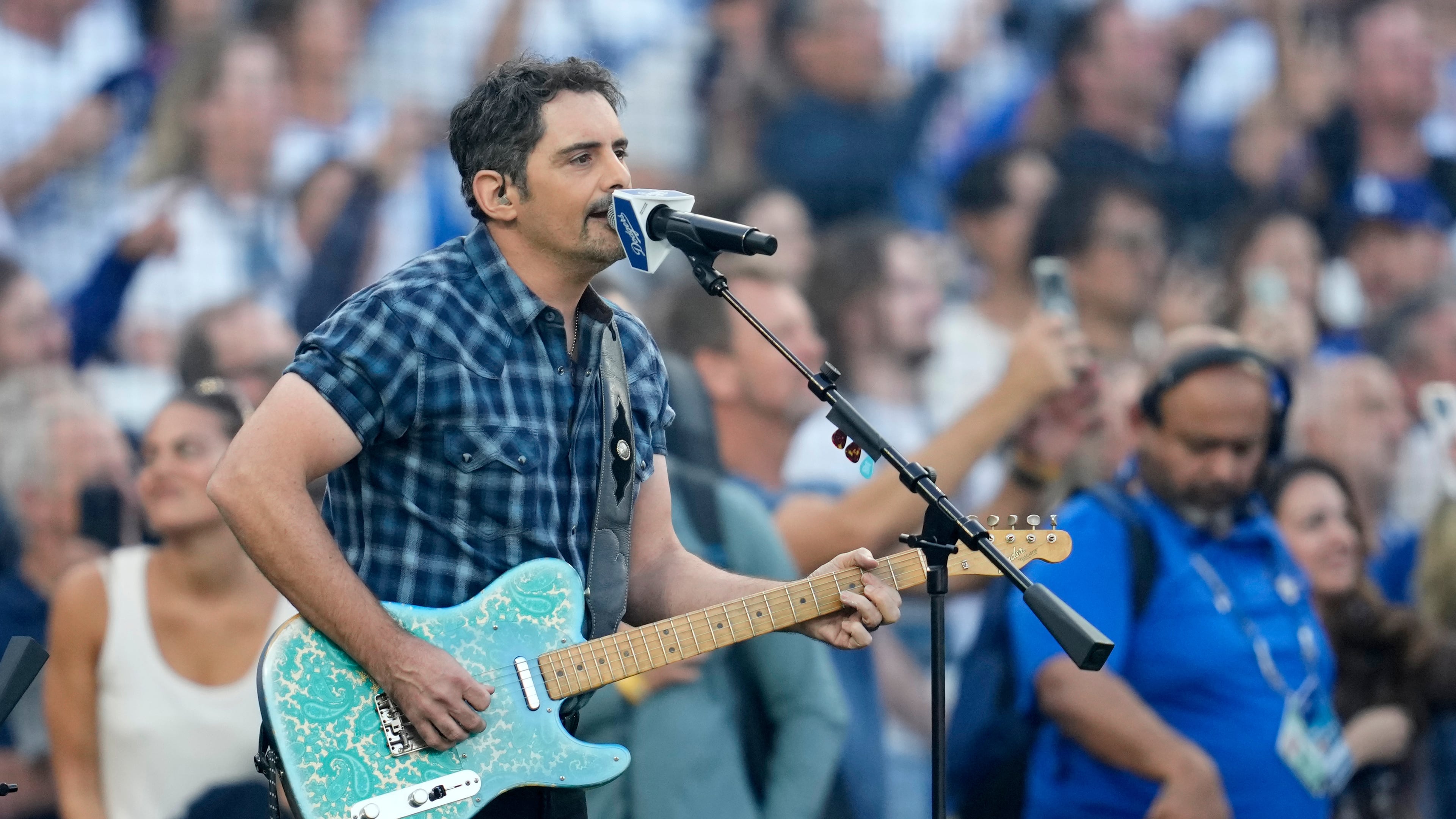 Recording artist Brad Paisley perform the national anthem prior to Game 3 of baseball's World Series between the Toronto Blue Jays and the Los Angeles Dodgers, Monday, Oct. 27, 2025, in Los Angeles. (AP Photo/Ashley Landis)