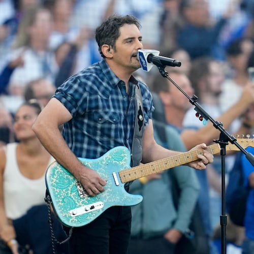 Recording artist Brad Paisley perform the national anthem prior to Game 3 of baseball's World Series between the Toronto Blue Jays and the Los Angeles Dodgers, Monday, Oct. 27, 2025, in Los Angeles. (AP Photo/Ashley Landis)