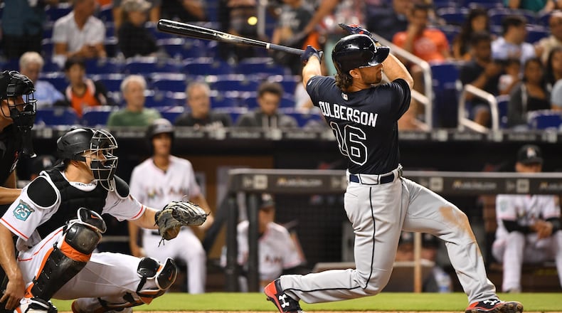 Charlie Culberson of the Atlanta Braves doubles for an rbi in the sixth inning against the Miami Marlins at Marlins Park on July 23, 2018 in Miami, Florida. (Photo by Mark Brown/Getty Images)