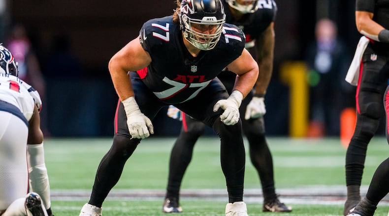 Atlanta Falcons offensive tackle Storm Norton (77) lines up during the second half of an NFL football game against the Houston Texans, Sunday, Oct. 8, 2023, in Atlanta. The Atlanta Falcons won 21-19. (AP Photo/Danny Karnik)