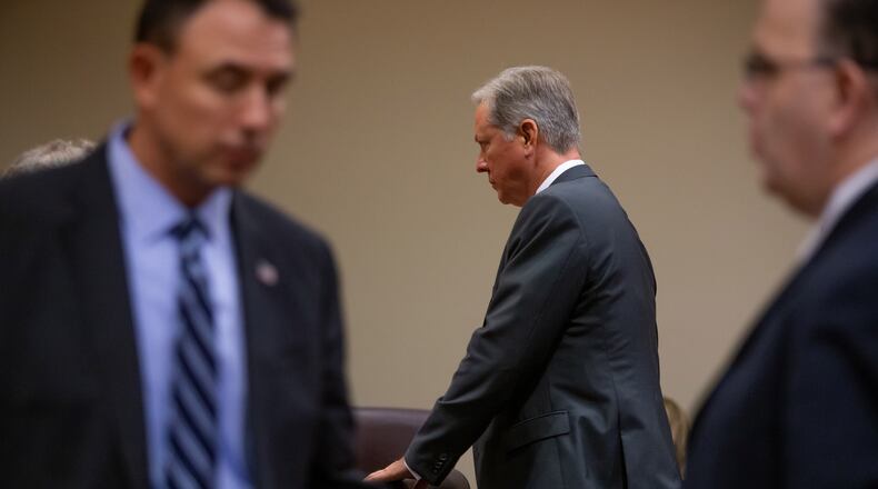 Robert “Chip” Olsen prepares to leave the courtroom at recess during his murder trial at the DeKalb County Courthouse on October 4, 2019.  The jury was deliberating. STEVE SCHAEFER / SPECIAL TO THE AJC