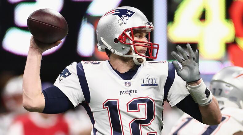 ATLANTA, GA - FEBRUARY 03: Tom Brady #12 of the New England Patriots throws a pass against the Los Angeles Rams in the first half during Super Bowl LIII against the Los Angeles Rams at Mercedes-Benz Stadium on February 3, 2019 in Atlanta, Georgia. (Photo by Jamie Squire/Getty Images)