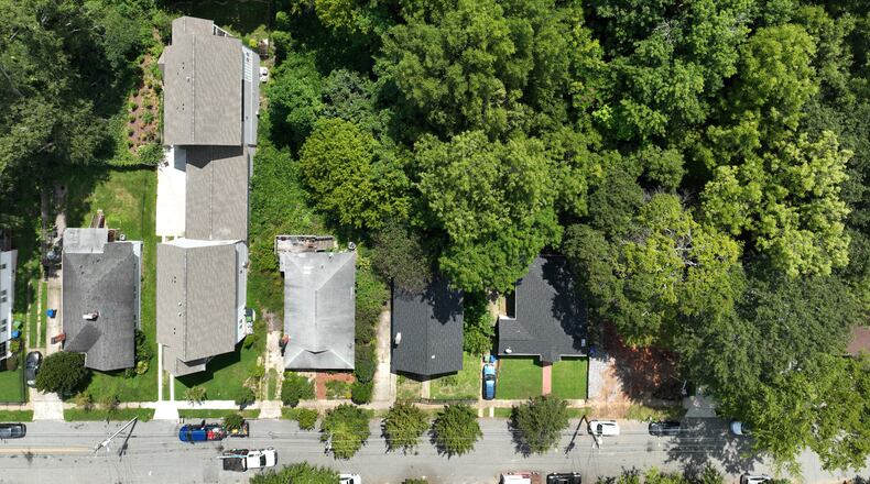 An aerial view of older homes (left) and new residential housing in the Reynoldstown neighborhood in 2022. (Hyosub Shin/AJC 2022)