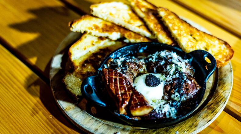 The huevo con trufa with foie gras at the Iberian Pig Buckhead is a decadent winter treat.