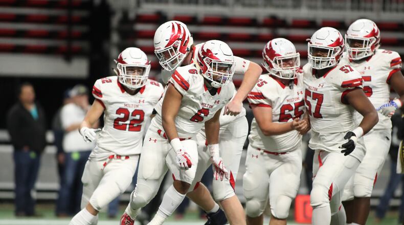 December 12, 2018 - Atlanta, Ga: Milton running back Josh Edwards (6) celebrates his 11-yard go-ahead touchdown run in the fourth quarter against Colquitt County during the Class AAAAAAA State Championship at Mercedes-Benz Stadium Wednesday, December 12, 2018, in Atlanta. Milton won 14-13. (JASON GETZ/SPECIAL TO THE AJC)