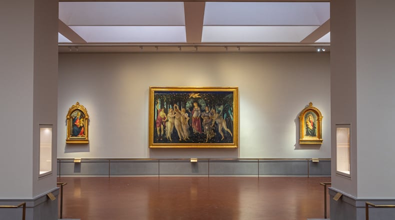 This picture made available Tuesday, June 16, 2026 shows a view of the renovated and refurbished Botticelli rooms, with Renaissance master Sandro Botticelli's paintings: "Spring ", center, "Madonna of the Rose Garden", left and "Madonna in glory with Seraphim" displayed at Florence's Uffizi Galleries, Italy. (Press Office of the Uffizi Gallery Museum via AP)