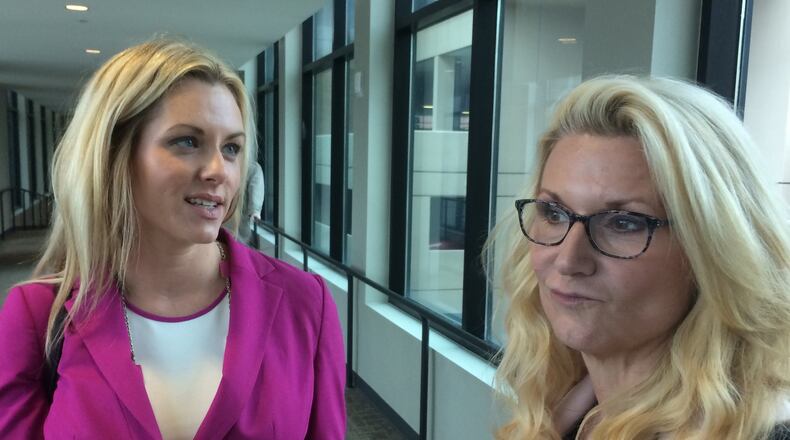 Defense lawyers Ashleigh Merchant (left) and Kim Frye after a hearing in which prosecutors wanted them to stop talking on Facebook about a certain murder case. Photo by Bill Torpy