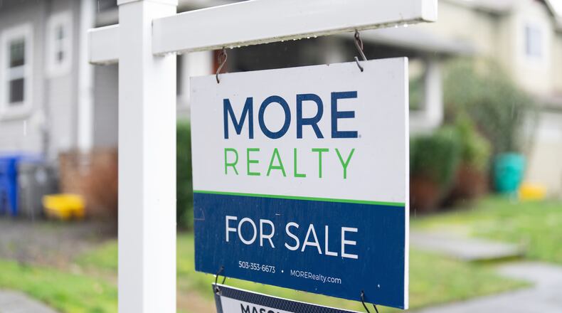 A "For Sale" sign is seen on Tuesday, Jan. 6, 2026, in Portland, Ore. (AP Photo/Jenny Kane)