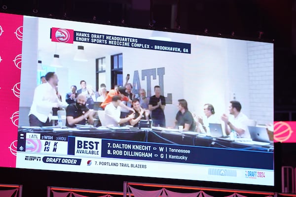 Atlanta Hawks staff is excited for their number one draft pick of Zaccharie Risacher, from France, during the Hawks Draft Viewing Party on Wednesday, June 26, 2024, in Atlanta, at State Farm Arena in Atlanta, Georgia. (Atlanta Journal-Constitution/Jason Allen)