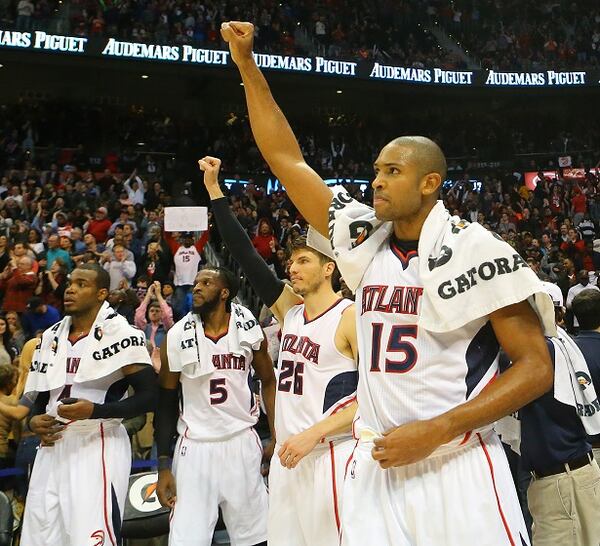 From left to right, Atlanta Hawks Paul Millsap, DeMarre Carroll, Kyle Korver and Al Horford celebrate after setting a franchise record by defeating the Oklahoma Thunder 103-93 in an NBA basketball game on Friday, Jan. 23, 2015, in Atlanta. (AP Photo/Atlanta Journal-Constitution, Curtis Compton) MARIETTA DAILY OUT; GWINNETT DAILY POST OUT; LOCAL TELEVISION OUT; WXIA-TV OUT; WGCL-TV OUT They just don't lose. (Curtis Compton/AJC photo)