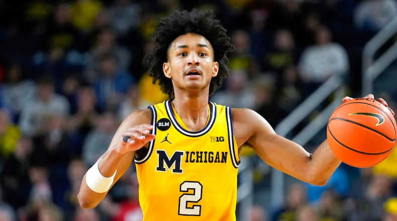 Michigan guard Kobe Bufkin (2) plays against Wisconsin in the second half of an NCAA college basketball game in Ann Arbor, Mich., Sunday, Feb. 26, 2023. (AP Photo/Paul Sancya)