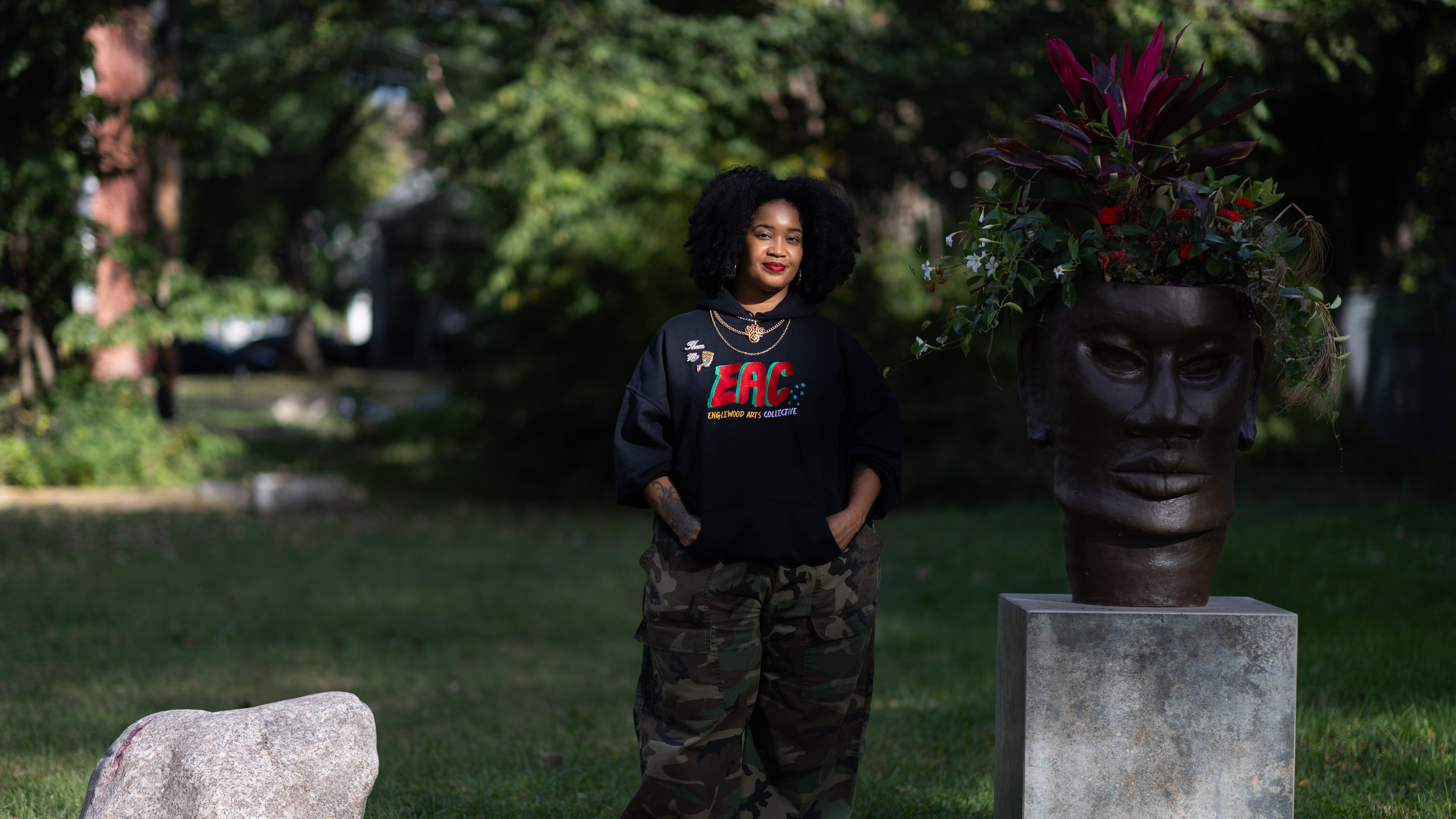 Artist Tonika Lewis Johnson stands for portrait in the 6500-block of South Aberdeen Street in Chicago's Englewood neighborhood, on Monday, Oct. 6, 2025. (AP Photo/Talia Sprague)