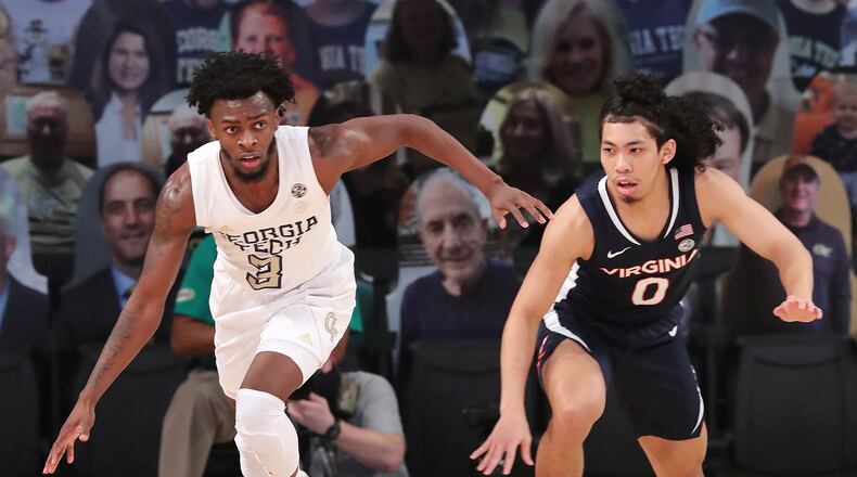 021021 Atlanta: Georgia Tech guard Bubba Parham steals from Virginia guard Kihei Clark in an NCAA college basketball game on Wednesday, Feb 10, 2021, in Atlanta. Curtis Compton / Curtis.Compton@ajc.com”