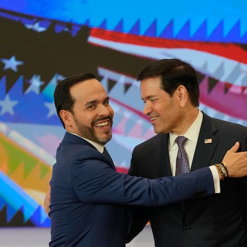 Colombian President Abelardo De La Espriella, left, and U.S. Secretary of State Marco Rubio embrace during a bilateral agreements signing ceremony in Barranquilla, Colombia, Tuesday, Sept. 8, 2026. (AP Photo/Fernando Vergara, Pool)