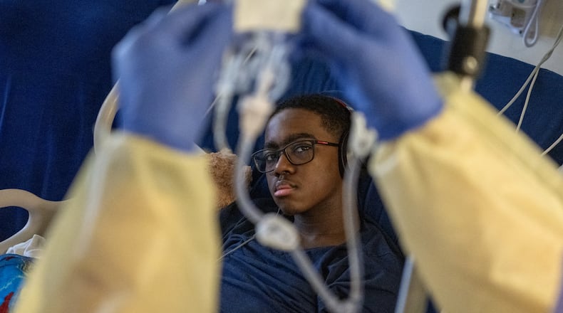 Kendric Cromer, 12, undergoes infusion gene therapy at Children’s National Hospital in Washington, Sept. 11, 2024. Cromer is one of the first children ever to be treated with a newly approved gene therapy that will free him from the sickle cell disease that has stolen his childhood. (Kenny Holston/The New York Times)