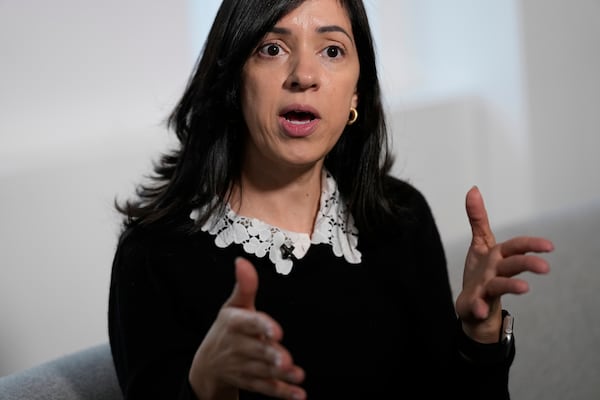Casandra Almonte speaks to reporters in New York, Thursday, March 20, 2025. (AP Photo/Seth Wenig)