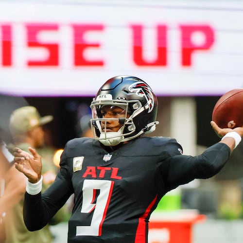 Falcons quarterback Michael Penix Jr. attempts a pass during warm-ups before a game against the Panthers at Mercedes-Benz Stadium on Sunday, Nov. 16, 2025, in Atlanta. (Miguel Martinez/AJC)