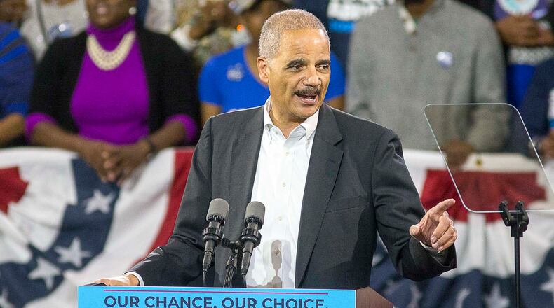 11/02/2018 -- Atlanta, Georgia -- Former U.S. Attorney General Eric Holder speaks during a rally for gubernatorial candidate Stacey Abrams in Forbes Arena at Morehouse College, Friday, November 2, 2018.  (ALYSSA POINTER/ALYSSA.POINTER@AJC.COM)