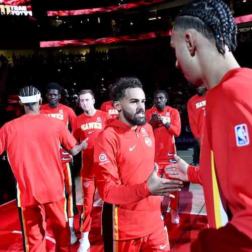 Atlanta Hawks guard Trae Young's injury has forced the team to adapt, but it's also allowed younger players to shine and develop in his absence. (Hyosub Shin/AJC)