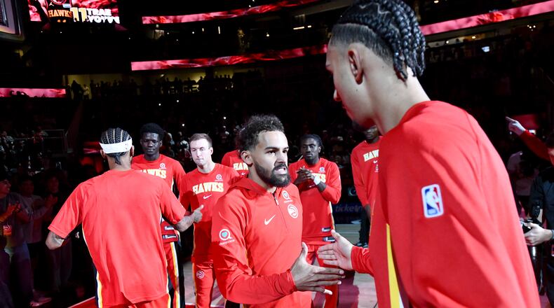 Atlanta Hawks guard Trae Young's injury has forced the team to adapt, but it's also allowed younger players to shine and develop in his absence. (Hyosub Shin/AJC)