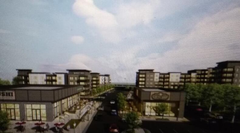 A restaurant and another commercial building are expected to front Cobb Parkway South with 303 apartments behind them. (Courtesy of Marietta)