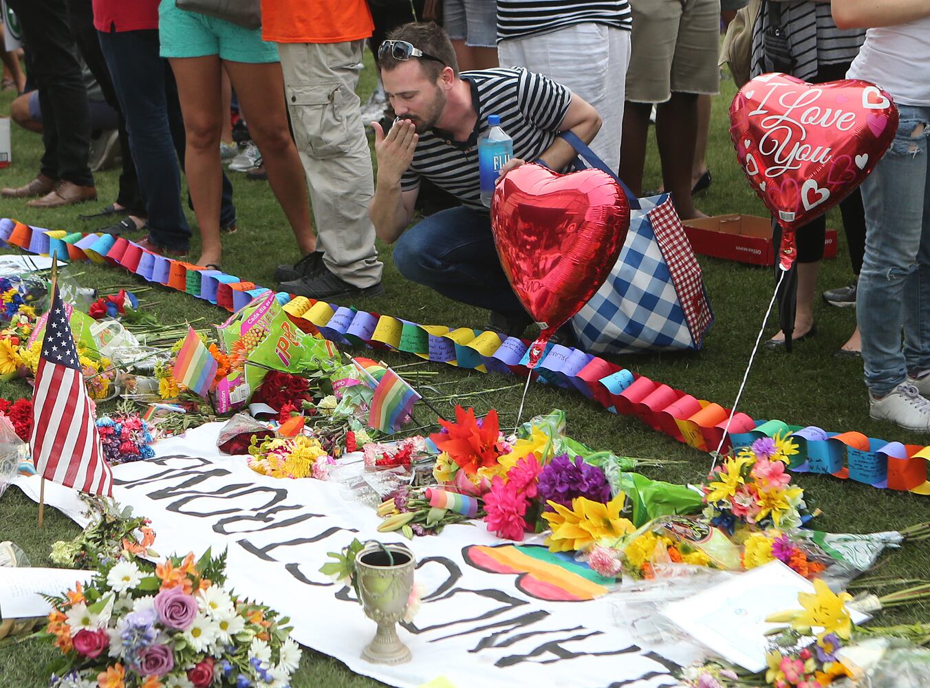 Photos: Vigil for family, friends of Orlando shootings