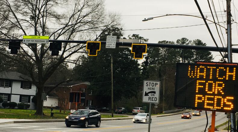 The new Pedestrian Hybrid Beacon looking west on Scott Boulevard fronting Westchester Elementary (not shown). Bill Banks for the AJC