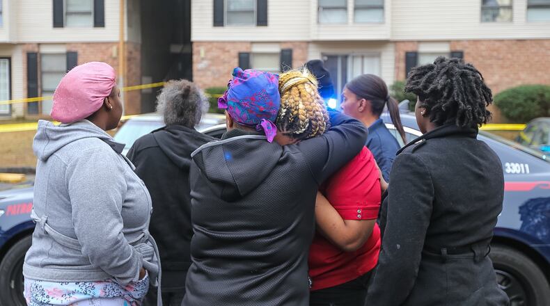 Police are investigating a shooting that left one man dead Monday at Deerfield Gardens apartments. JOHN SPINK / JSPINK@AJC.COM