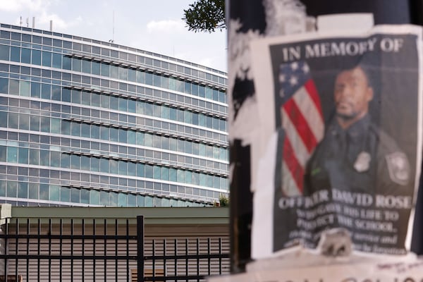 Officer David Rose is honored outside the Centers for Disease Control and Prevention. (Natrice Miller/AJC)