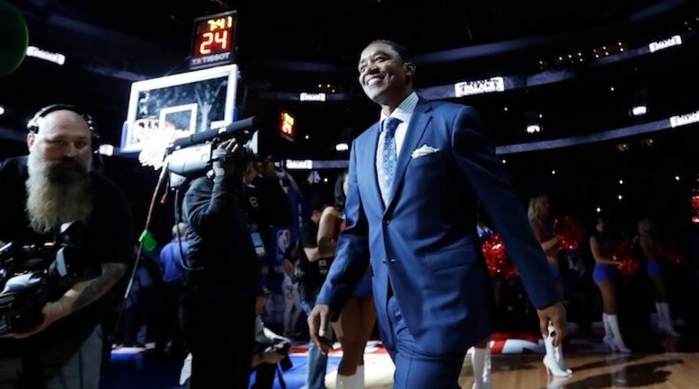 Isiah Thomas, former Detroit Pistons leader of the Bad Boys is introduced during a halftime ceremony of an NBA basketball game, Monday, April 10, 2017, in Auburn Hills, Mich. Former Pistons players attended the last game at the Palace before the team moves to downtown Detroit. (AP Photo/Carlos Osorio)