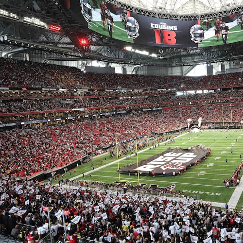 Fans cheer as Atlanta Falcons quarterback Kirk Cousins (18) is presented moments before the game against the Pittsburgh Steelers, Sept. 8, 2024, at Mercedes-Benz Stadium in Atlanta.
(Miguel Martinez/ AJC)