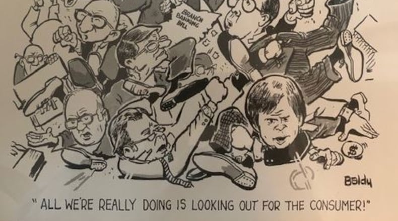 Wayne Garner’s autographed copy of an Atlanta Constitution editorial cartoon drawn by Cliff “Baldy” Baldowski, depicting one of the legislative clashes between community banks and larger ones. That’s Garner in the lower right-hand corner.