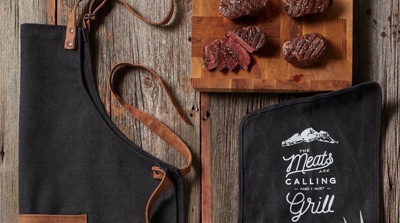 This grilling set features stainless steel cooking tools, an apron and of course, filet mignon. Contributed Hickory Farms