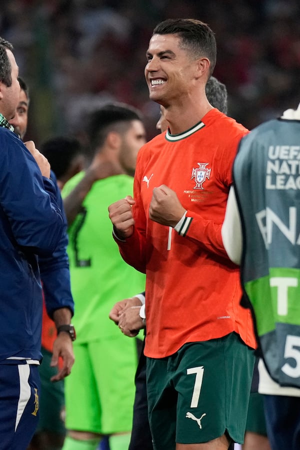 Portugal's Cristiano Ronaldo celebrates after the Nations League final soccer match between Portugal and Spain at the Allianz Arena in Munich, Germany, Sunday, June 8, 2025. (AP Photo/Matthias Schrader)
