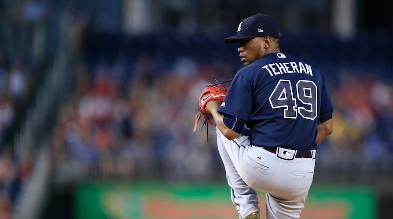 Braves starting pitcher Julio Teheran winds up against the Washington Nationals on Tuesday. (AP Photo/Manuel Balce Ceneta)